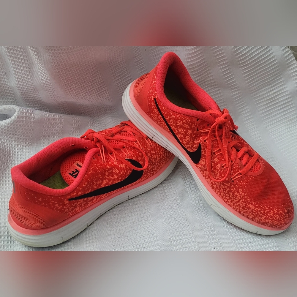 Nike Womens Orange White size 10